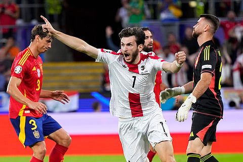 Georgia's Khvicha Kvaratskhelia celebrates a goal